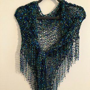Artist's hand crocheted triangle shawl.